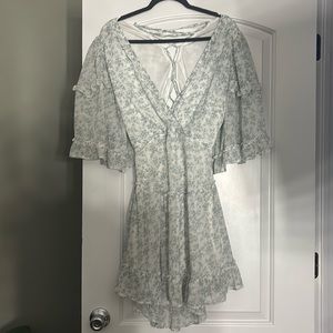 Short sleeve mini dress with tie up back , lower back exposed